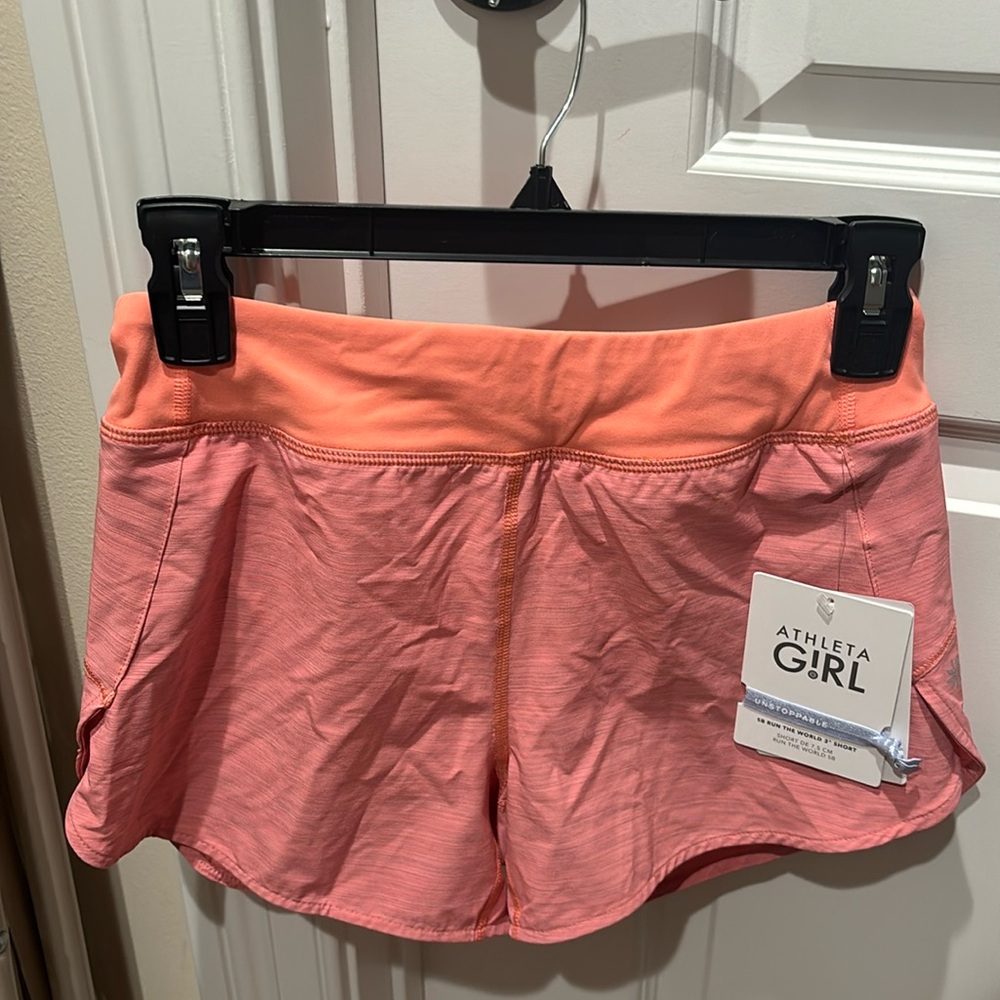 - Athleta shorts-orange. Size:12 girls